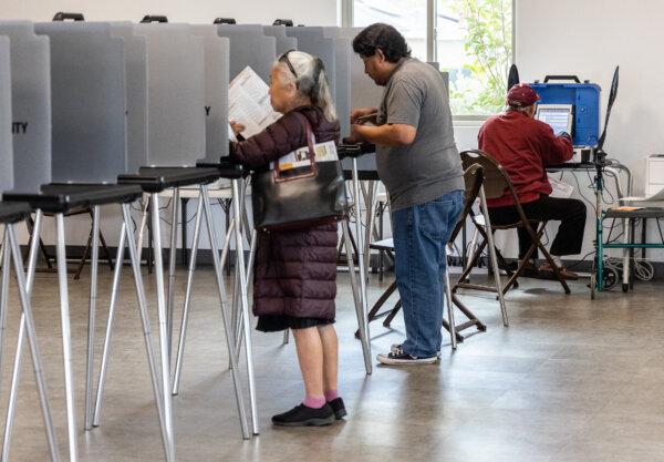 Voters cast their ballots in Garden Grove, Calif., on March 5, 2024. (John Fredricks/The Epoch Times)
