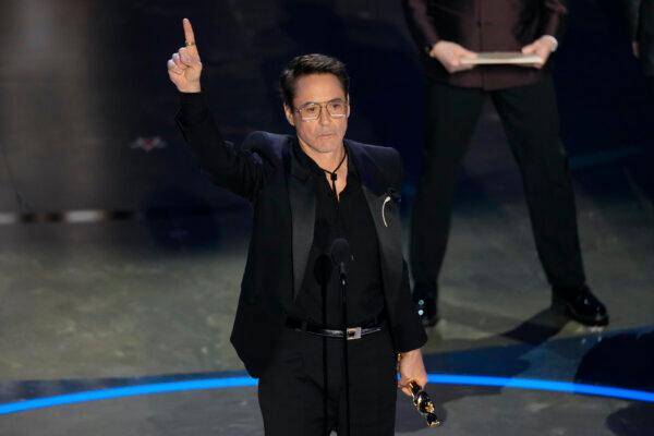 Robert Downey Jr. accepts the award for best performance by an actor in a supporting role for "Oppenheimer" during the Oscars at the Dolby Theatre in Los Angeles on March 10, 2024. (Chris Pizzello/AP Photo)