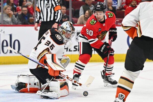 Anaheim Ducks goaltender John Gibson (36) tracks a shot in the first period as Chicago Blackhawks forward Tyler Johnson (90) waits for the rebound in Chicago on March 12, 2024. (Jamie Sabau/USA TODAY Sports via Field Level Media)