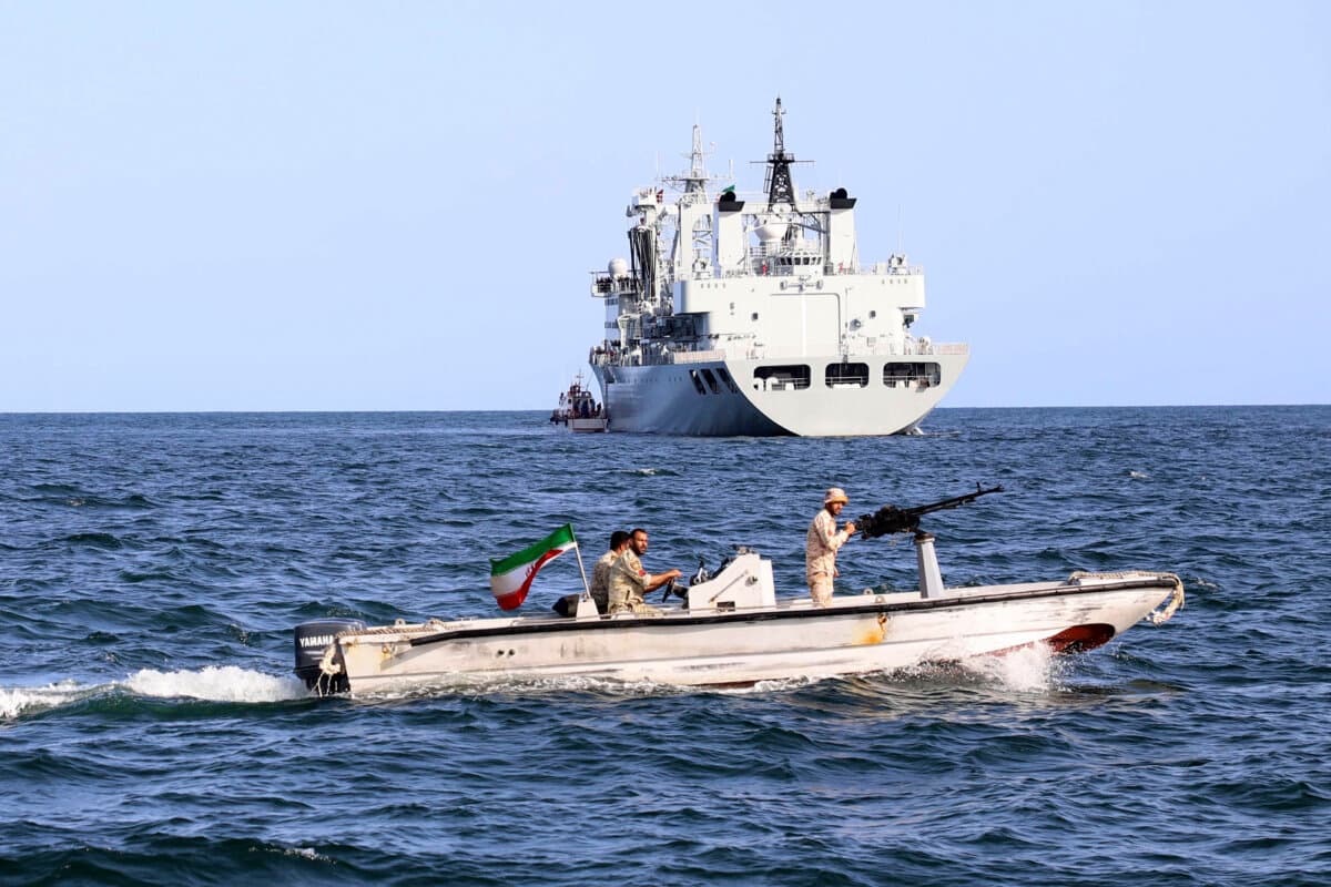 An Iranian military boat patrols as a warship enters Iranian waters prior to a joint naval drill of Iran, Russia, and China, in the Indian Ocean on March 12, 2024. (Iranian Army via AP)