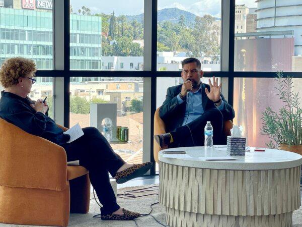 Hollywood Partnership President Kathleen Rawson interviews Los Angeles City Councilman Hugo Soto-Martinez at a town hall event in Hollywood on March 16, 2024. (Beige Luciano-Adams/The Epoch Times)