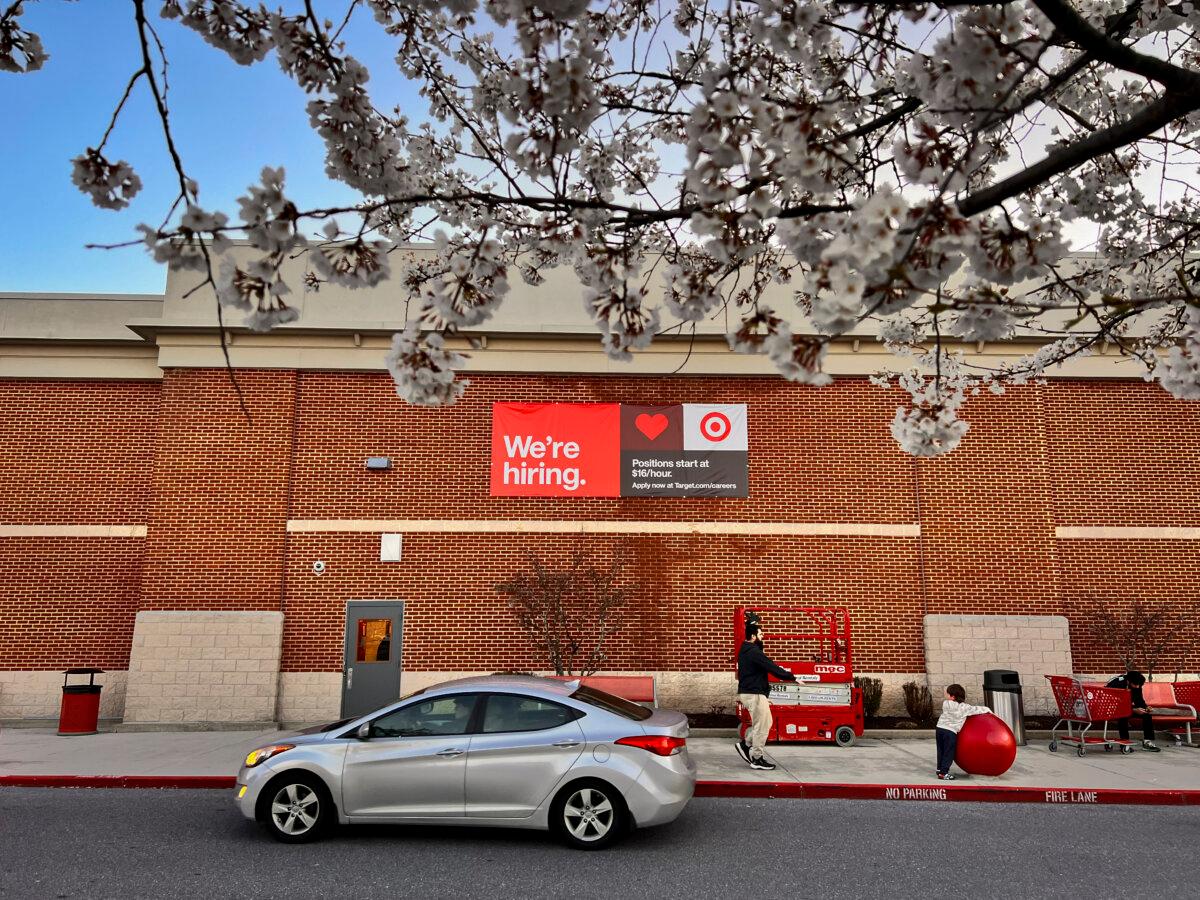 A hiring sign at a grocery store in Ellicott City, Md., on March 24, 2024. (Madalina Vasiliu/The Epoch Times)