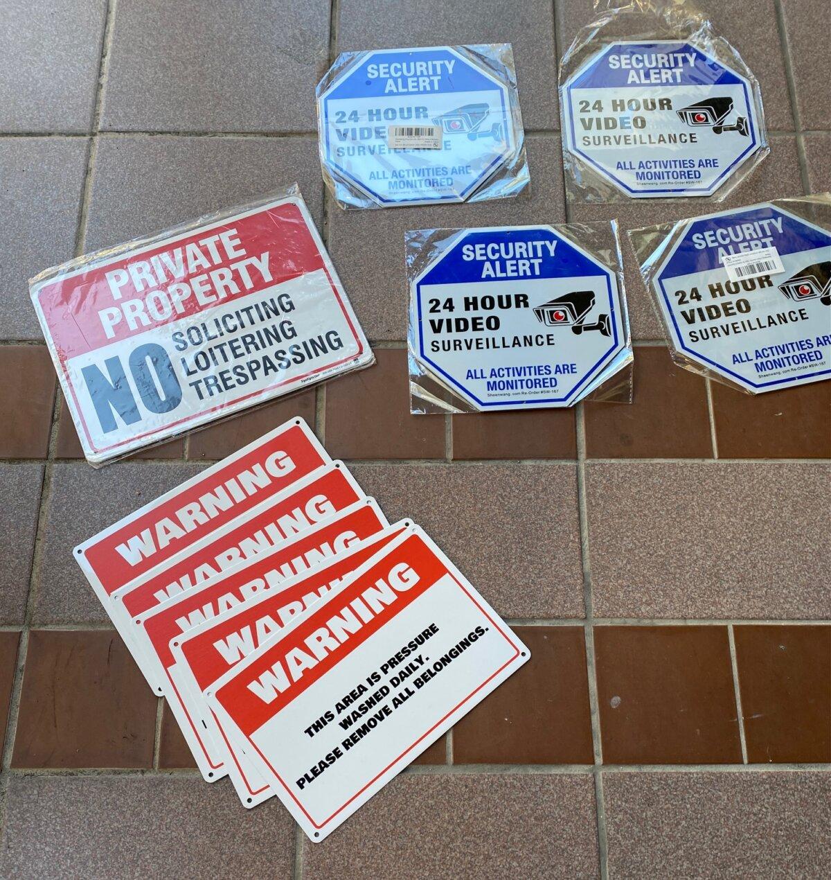 Signs printed by residents to deter homeless encampments. (Courtesy of Keith Johnson)