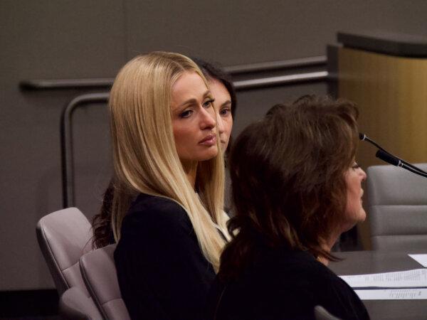 Paris Hilton and state Sen. Shannon Grove speak to the Senate's Human Services Committee on April 15, 2024. (Travis Gillmore/The Epoch Times)