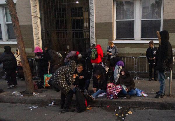 People roam the streets of San Francisco, Calif., on March 7, 2024. (John Fredricks/The Epoch Times)