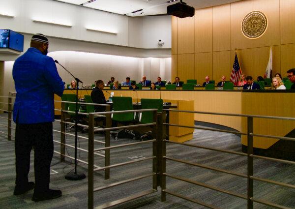 Yusef Miller speaks in support of Assembly Bill 3089 at the Assembly's Appropriations Committee on May 1, 2024. (Travis Gillmore/The Epoch Times)