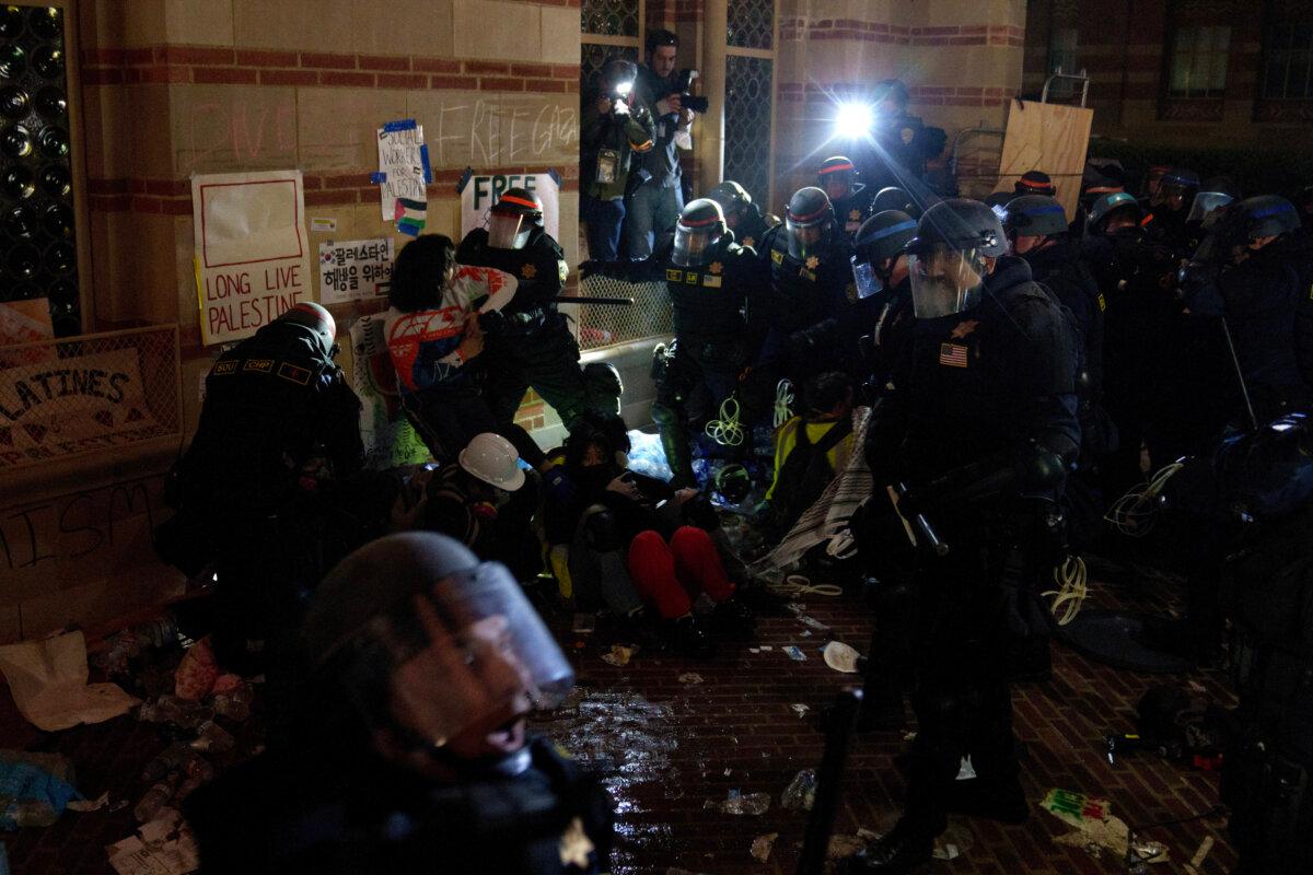 Members of law enforcement enter a pro-Palestinian encampment at UCLA in Los Angeles on May 2, 2024. (Eric Thayer/Getty Images)