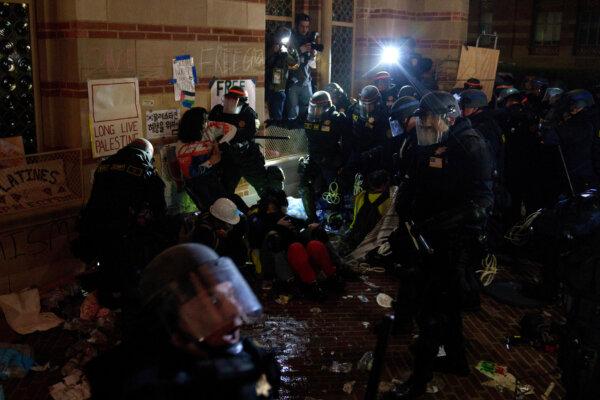 Members of law enforcement enter a Pro-Palestinian encampment at UCLA in Los Angeles on May 2, 2024. (Eric Thayer/Getty Images)