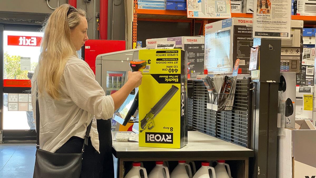 A customer uses a self-checkout lane at a Home Depot store in San Rafael, Calif., on July 25, 2023. (Justin Sullivan/Getty Images)