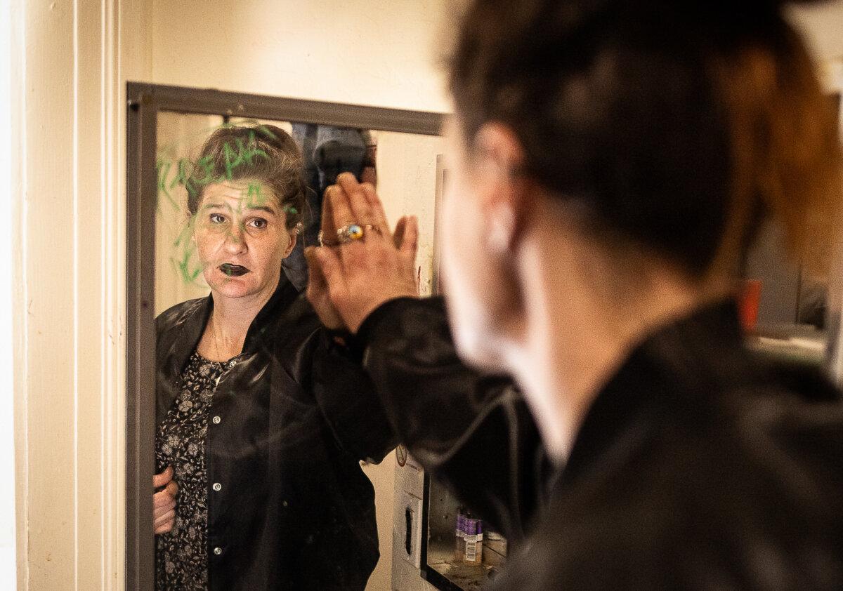 Roxanne Hubbard, an SRO resident, introduces her apartment unit in the Tenderloin district of San Francisco on May 16, 2024. (John Fredricks/The Epoch Times)