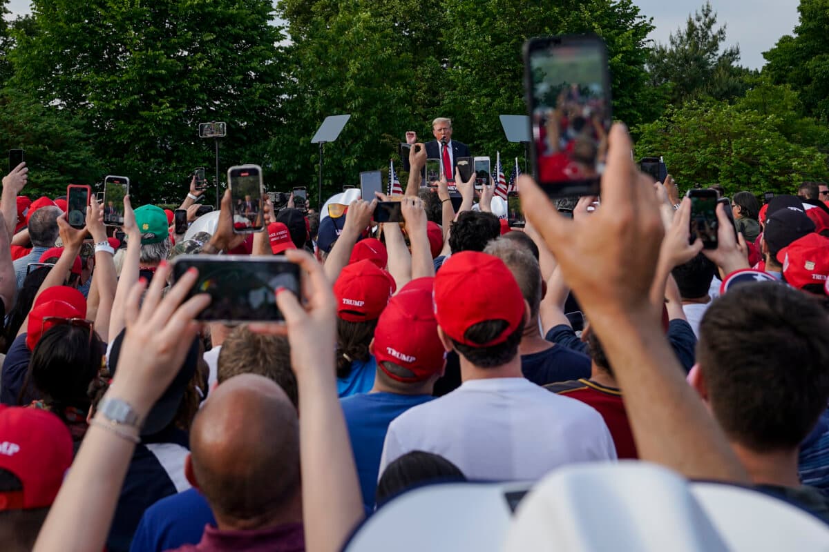Attendees at a rally with former President Donald Trump in the South Bronx in New York City on May 23, 2024. (Samira Bouaou/The Epoch Times)