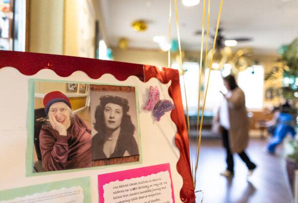 Current and classic photos of Sarah Sullivan on a posterboard at her party. (John Fredricks/The Epoch Times)