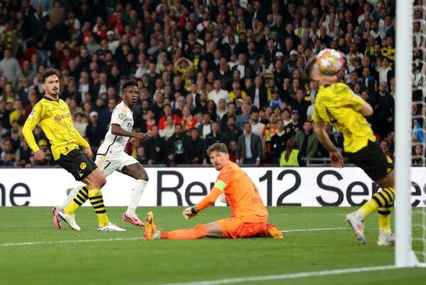 Vinicius Junior of Real Madrid celebrates scoring his team's second goal during the UEFA Champions League 2023/24 Final match between Borussia Dortmund and Real Madrid CF at Wembley Stadium in London on June 1, 2024. (Alex Pantling/Getty Images)