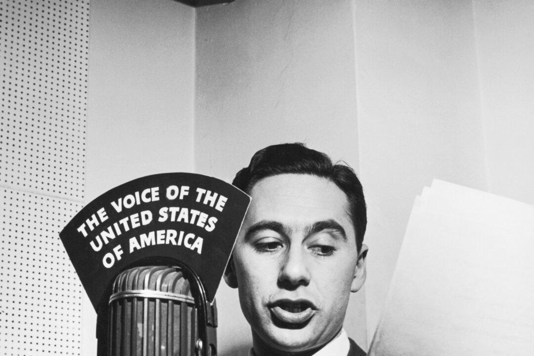 Russian-born writer and broadcaster Victor Franzusoff (1911 to 1996) broadcasts to the Soviet Union from the Voice Of America studios in New York City on March 12, 1948. (FPG/Hulton Archive/Getty Images)