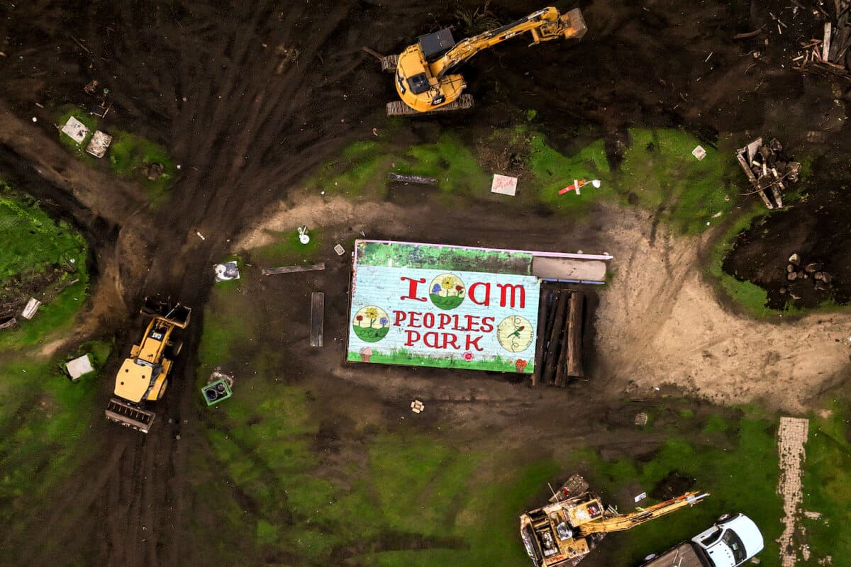Crews work to remove debris from People's Park in Berkeley, Calif. on Thursday, Jan. 4, 2024. (Brontë Wittpenn/San Francisco Chronicle via AP)