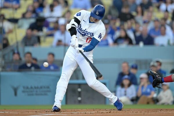 Shohei Ohtani (17) of the Los Angeles Dodgers hits a solo home run in the first inning against the Texas Rangers in Los Angeles on June 12, 2024. (Jayne Kamin-Oncea/Getty Images)