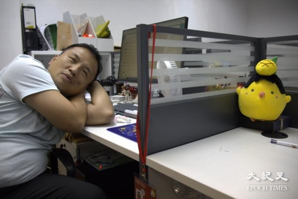 Ronson Chan appeared weary under the camera lens on the interview day. (Terence Tang/The Epoch Times)