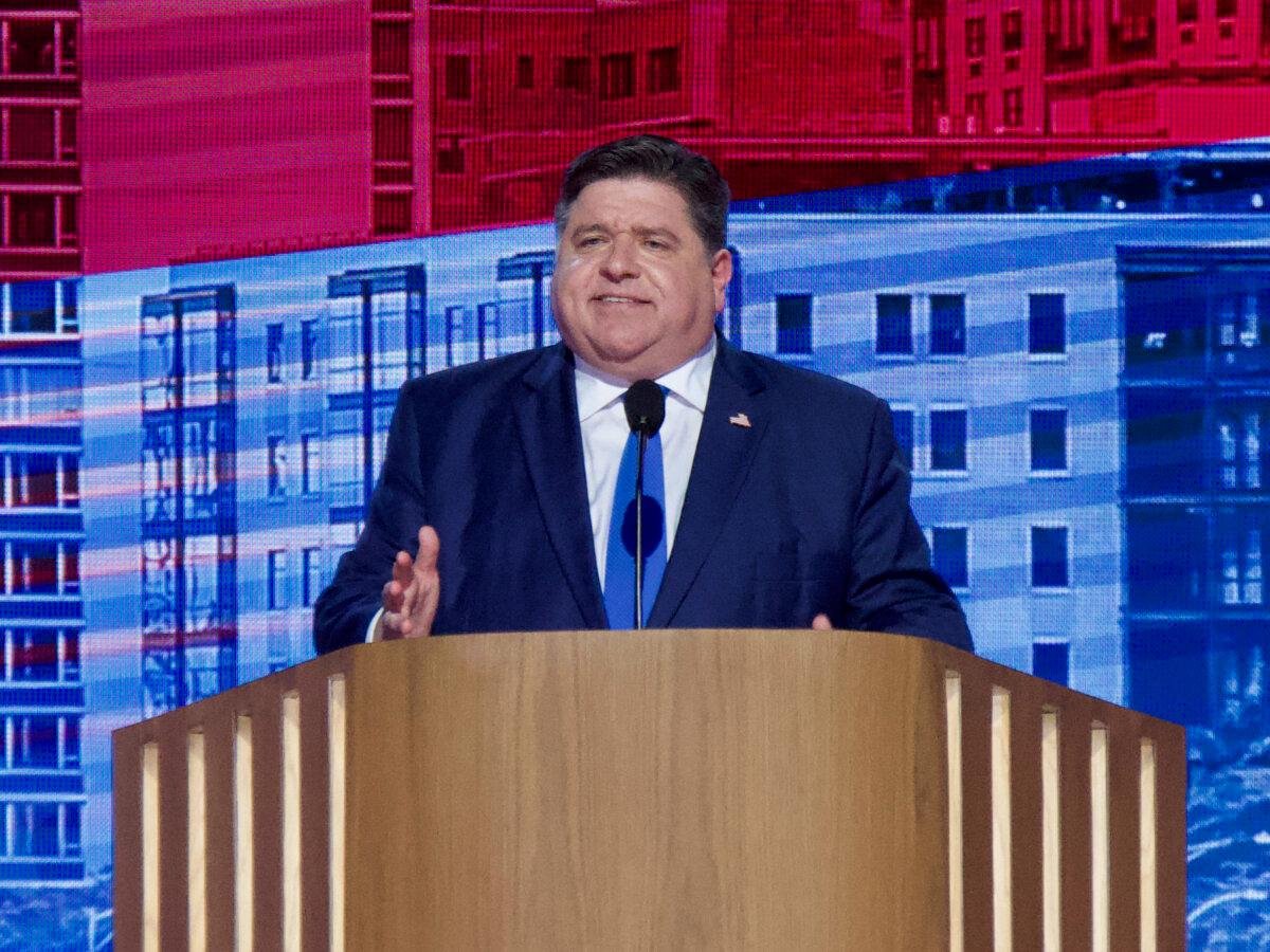 Illinois Gov. JB Pritzker addresses the crowd at the Democratic National Convention in Chicago on Aug. 20, 2024. (Travis Gillmore/The Epoch Times)