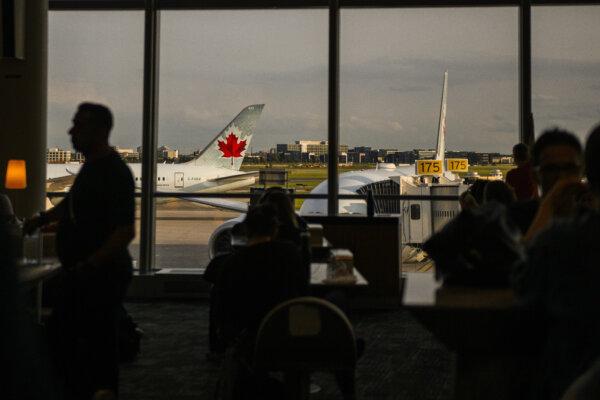 Planes are seen at the Pearson Airport in Toronto on July 24, 2024. (The Canadian Press/Christopher Katsarov)