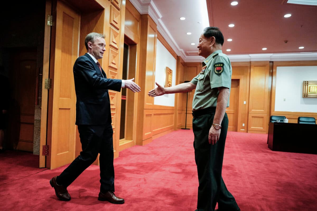 U.S. national security adviser Jake Sullivan (L) shakes hands with Zhang Youxia, vice chairman of China's Central Military Commission, before a meeting at the Bayi building in Beijing on Aug. 29, 2024. (Ng Han Guan/Pool/AFP via Getty Images)