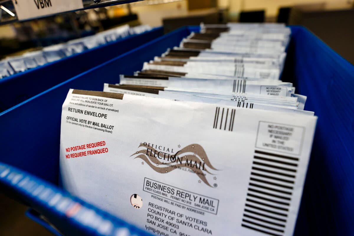Mail-in ballots sit in trays before being sorted at the Santa Clara County registrar of voters office in San Jose, Calif., on Oct. 13, 2020. (Justin Sullivan/Getty Images)