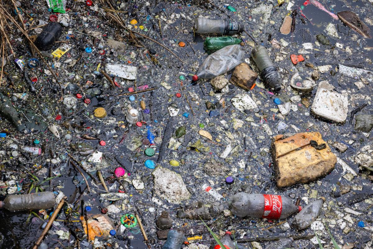 Trash builds up along the Tijuana River outside of San Diego, on Sept. 19, 2024. (John Fredricks/The Epoch Times)