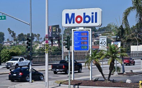 Vehicles pass a gas station in Rosemead, Calif., on Sept. 23, 2024. (Frederic J. Brown/AFP)