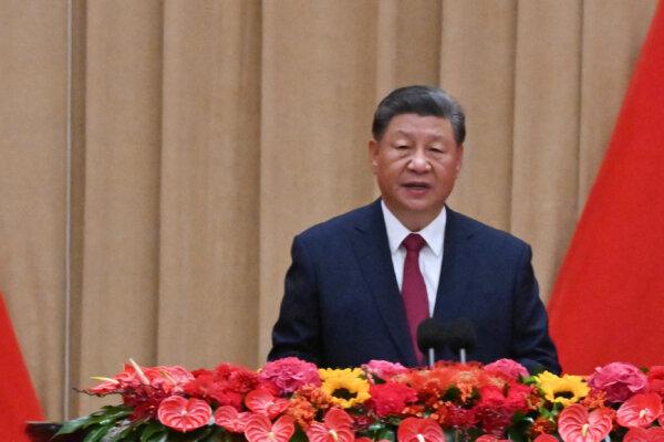 Chinese Communist Party leader Xi Jinping speaks at the podium during a reception in Beijing on Sept. 30, 2024. (Adek Berry/AFP via Getty Images)