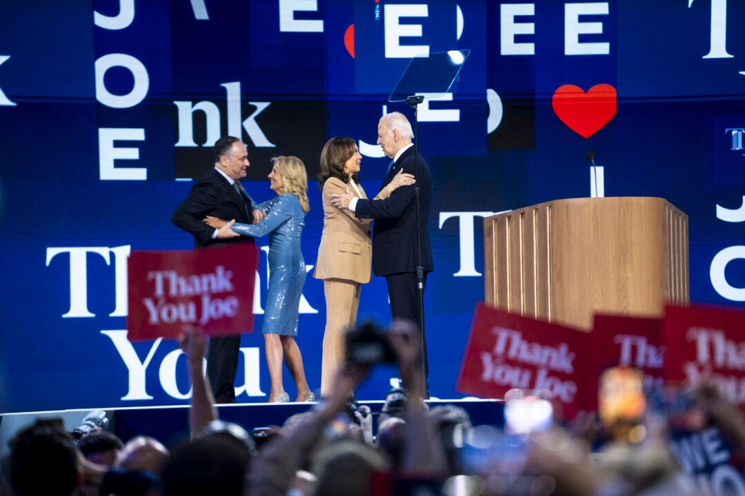 (L-R) Second Gentleman Douglas Emhoff, First Lady Jill Biden, Democratic presidential nominee Vice President Kamala Harris, and President Joe Biden on the stage at the end of the first day of the Democratic National Convention in Chicago on Aug. 19, 2024. (Madalina Vasiliu/The Epoch Times)