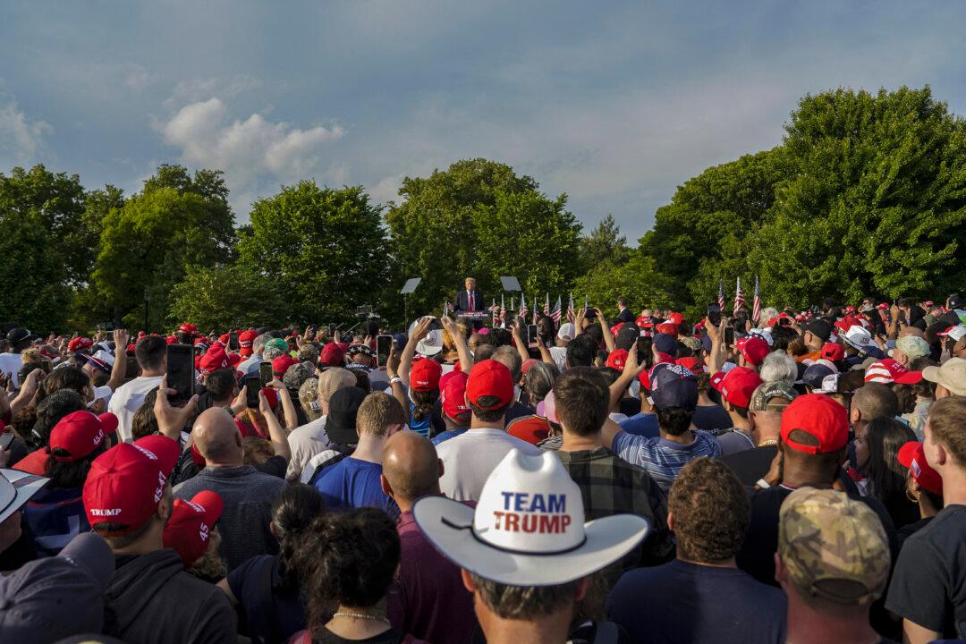 Attendees at a rally with former President Donald Trump in the South Bronx in New York City on May 23, 2024. (Samira Bouaou/The Epoch Times)