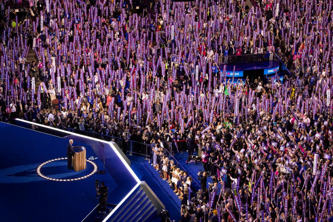 Vice Presidential nominee Tim Walz speaks to supporters at the Democratic National Convention held in Chicago on Aug. 21, 2024. (John Fredricks/The Epoch Times)