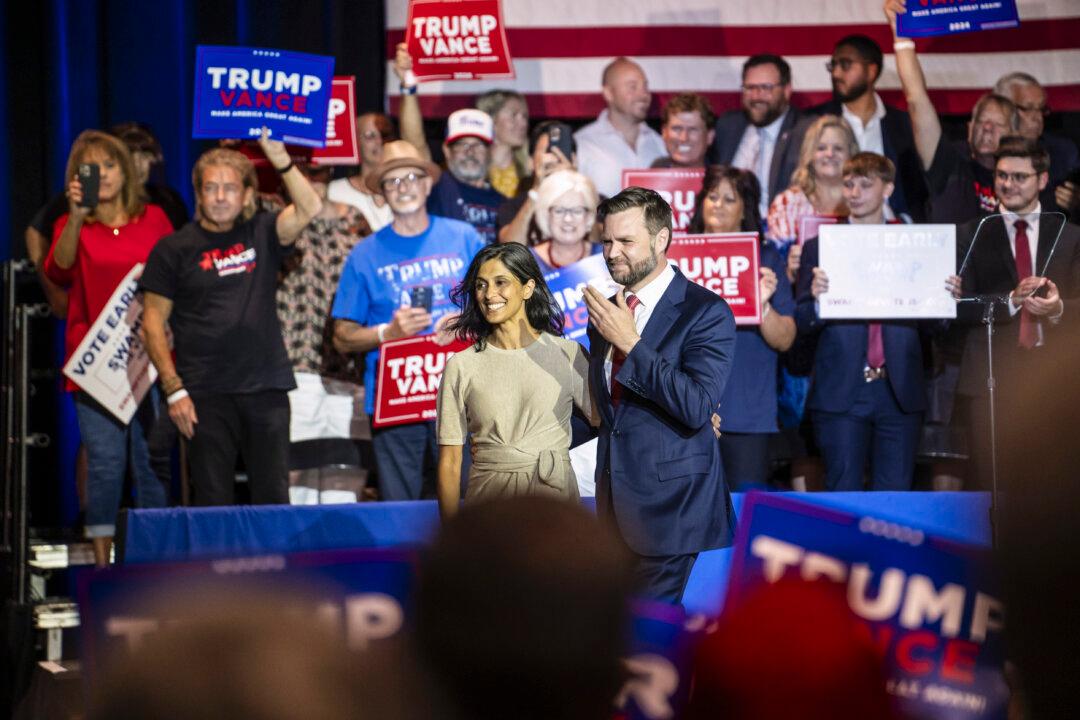 Republican vice president nominee Sen. JD Vance (R-Ohio) and his wife Usha Vance arrive at Middletown High School in Middletown, Ohio, on July 22, 2024. (Madalina Vasiliu/The Epoch Times)