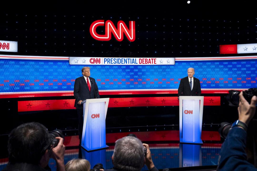 Former President Donald J. Trump and President Joe Biden during the presidential debate in Atlanta, Ga., on June 27, 2024. (Madalina Vasiliu/The Epoch Times)