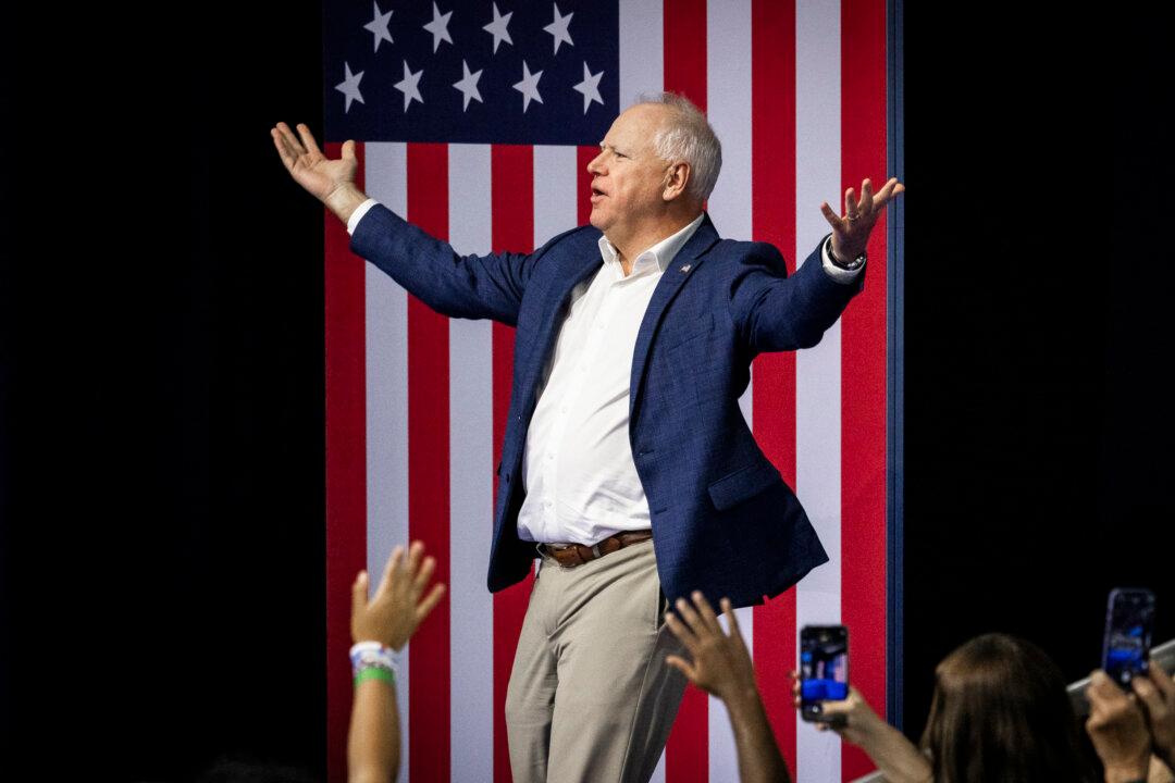 Democratic vice presidential nominee Tim Walz speaks in Madison, Wis., on Oct. 22, 2024. (John Fredricks/The Epoch Times)