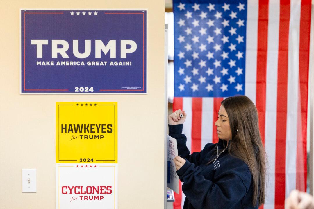 Volunteers manage a Donald Trump support center outside of Des Moines, Iowa., on Jan. 13, 2024. (John Fredricks/The Epoch Times)