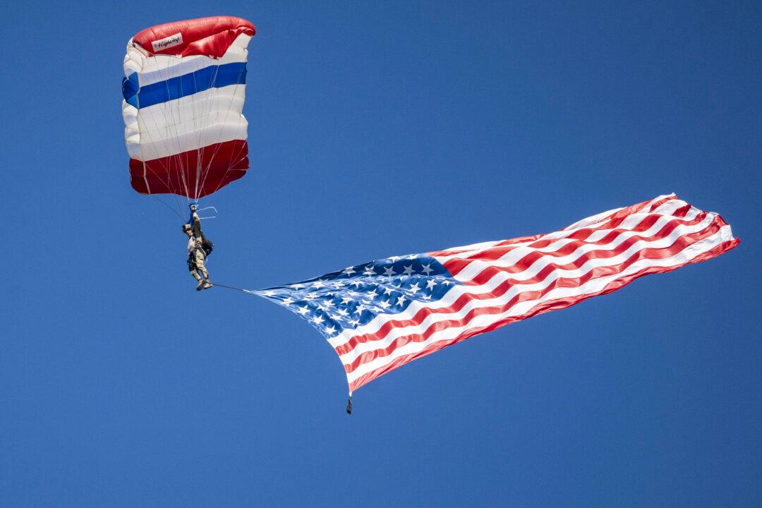 A Frog-X Parachute Team member performs at a rally with former President Donald J. Trump at Butler Farm Show in Butler, Pa., on Oct. 5, 2024. (Samira Bouaou/The Epoch Times)