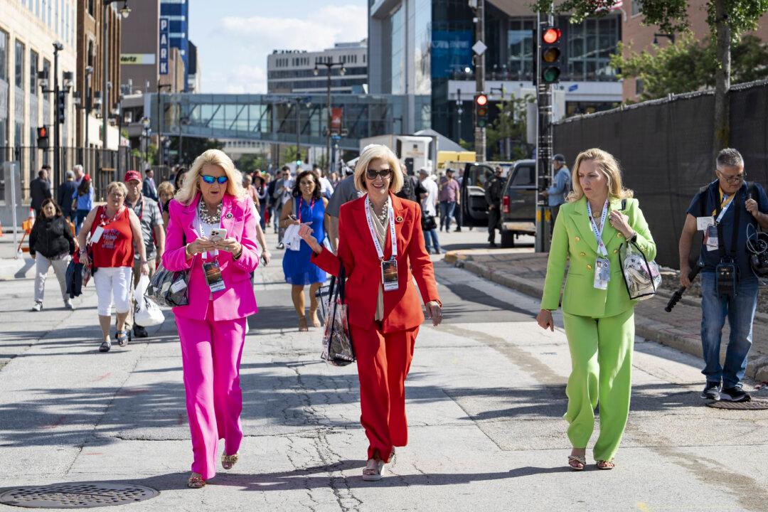 People walk around the Republican National Convention (RNC) grounds in Milwaukee, Wis., on July 17, 2024. (Madalina Vasiliu/The Epoch Times)