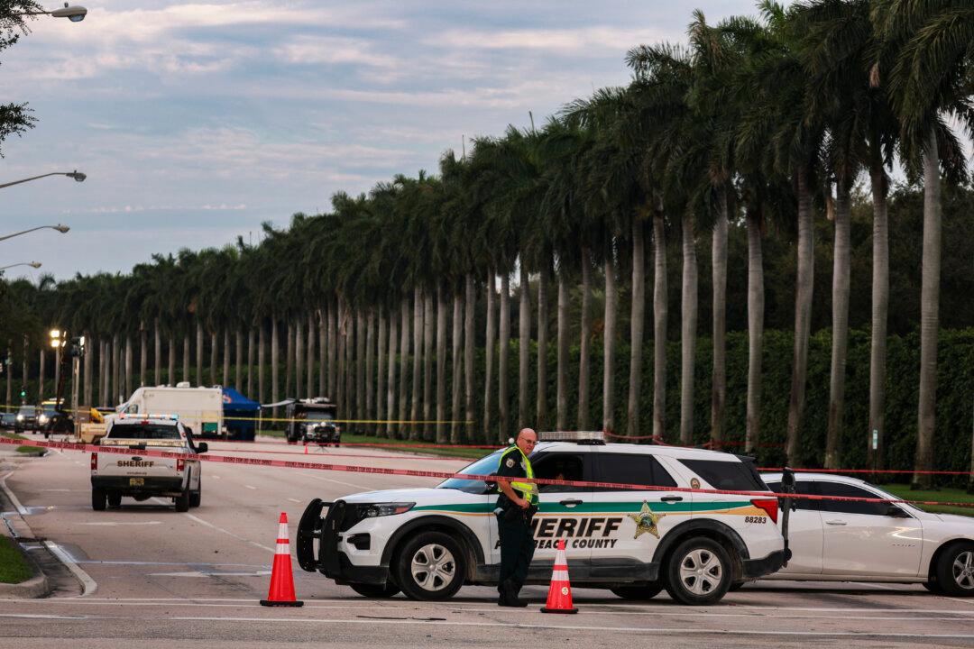 Palm Beach County Sheriff personnel block a road near the Trump International Golf Club after an assassination attempt of former President Donald Trump in West Palm Beach, Fla., on Sept. 16, 2024. (Joe Raedle/Getty Images)