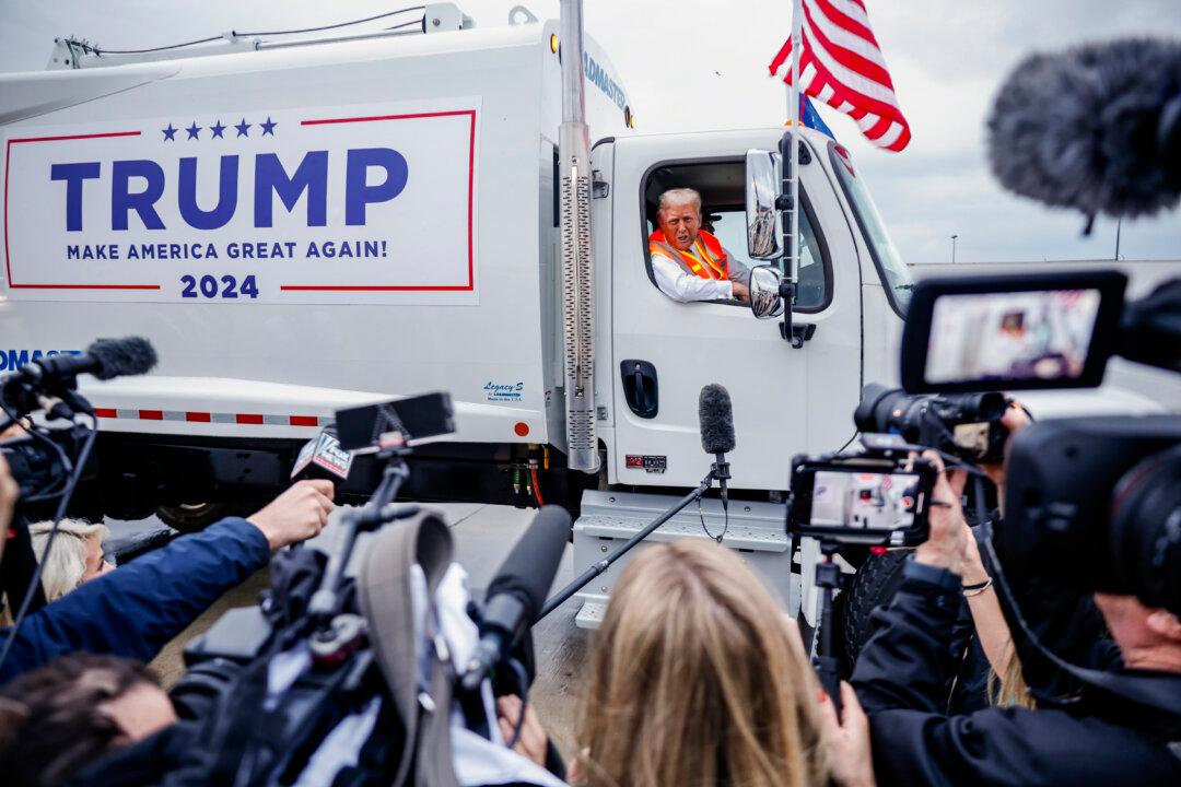 Republican presidential nominee, former President Donald Trump holds a press conference from a trash hauler at Green Bay Austin Straubel International Airport in Green Bay, Wis., on Oct. 30, 2024. (Chip Somodevilla/Getty Images)