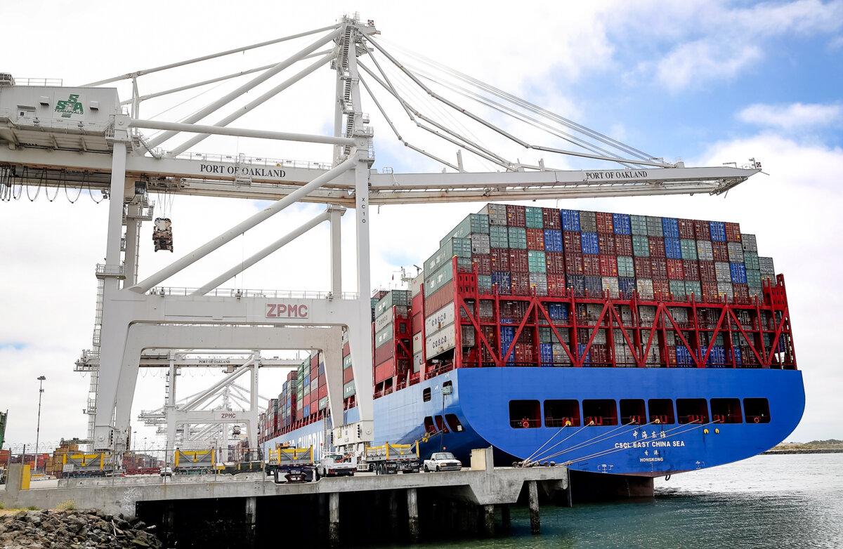 The CSCL East China Sea container ship sits in a berth at the Port of Oakland in Oakland, Calif., on June 20, 2018. A 2023 study estimated that tariffs imposed under Section 301 of the Trade Act of 1974 decreased imports from China by 13 percent each year from 2018 to 2021. (Justin Sullivan/Getty Images)