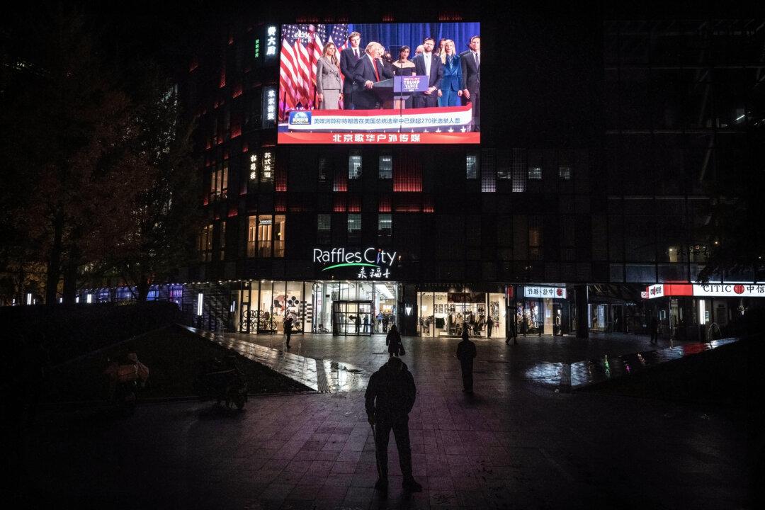 A screen broadcasts President-elect Donald Trump's speech on election night on CCTV's evening bulletin at a shopping mall in Beijing on Nov. 6, 2024. (Kevin Frayer/Getty Images)