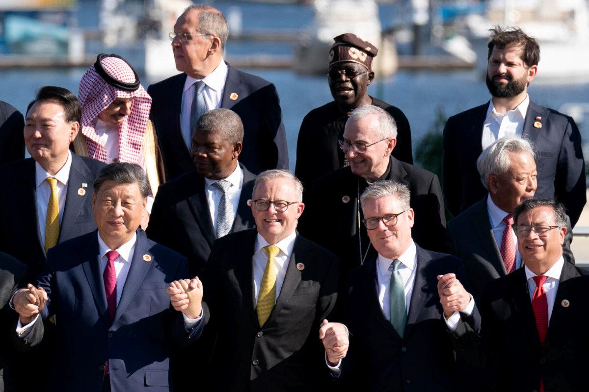 CCP Leader Xi Jinping, Australian Prime Minister Anthony Albanese, UK Prime Minister Sir Keir Starmer and Colombian President Gustavo Petro with leaders of the G20 members as they pose for the photo of the Global Alliance Against Hunger and Poverty at the G20 summit at the Museum of Modern Art in Rio de Janeiro, Brazil on Nov. 18, 2024. (Stefan Rousseau - WPA Pool/Getty Images)