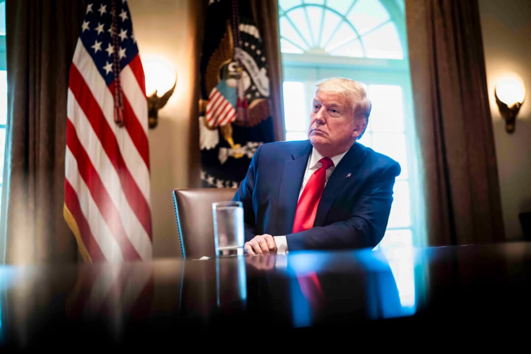 President Donald Trump listens during a roundtable meeting in the Cabinet Room of the White House on April 3, 2020. (Doug Mills-Pool/Getty Images)