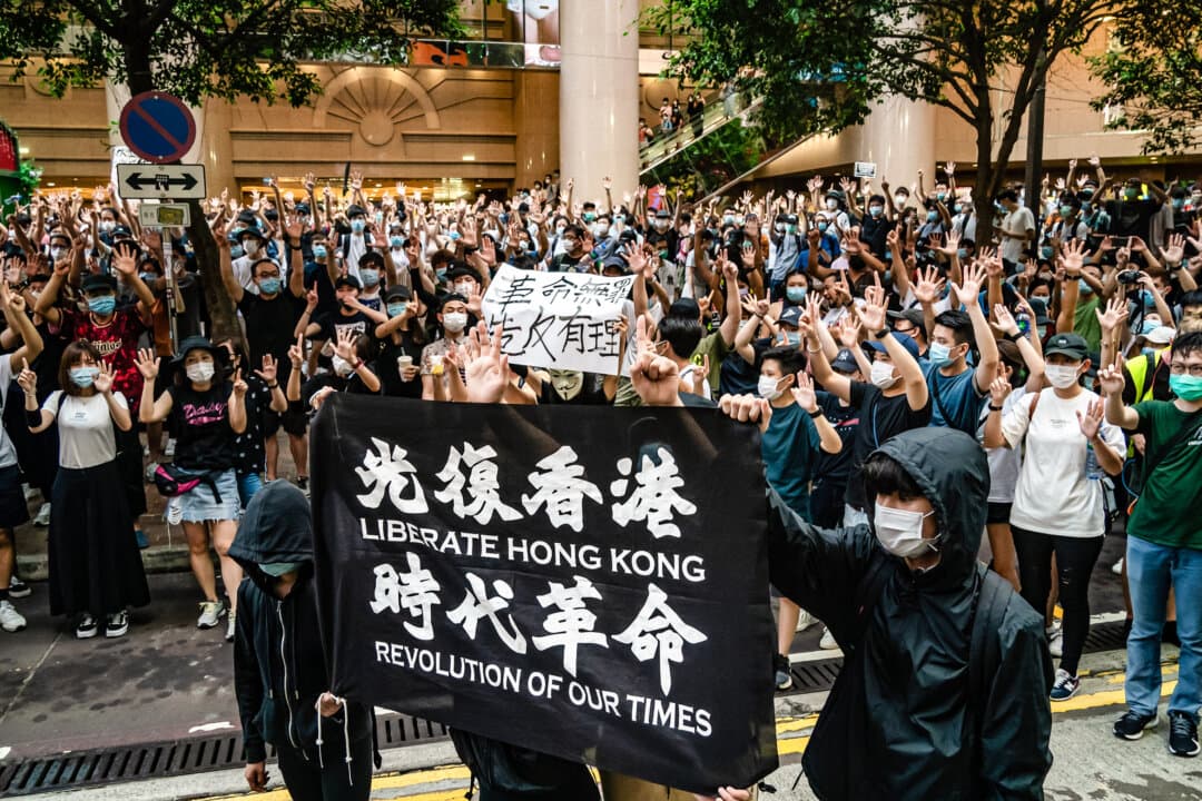 (Top) Falun Gong pratitioners march during a parade calling for the end of the Chinese Communist Party’s 25 years of ongoing persecution against Falun Gong in China, at the National Mall in Washington on July 11, 2024. (Bottom) Demonstrators take part in a protest against the Chinese Communist Party's new national security law in Hong Kong on July 1, 2020. (Larry Dye/The Epoch Times, Anthony Kwan/Getty Images)