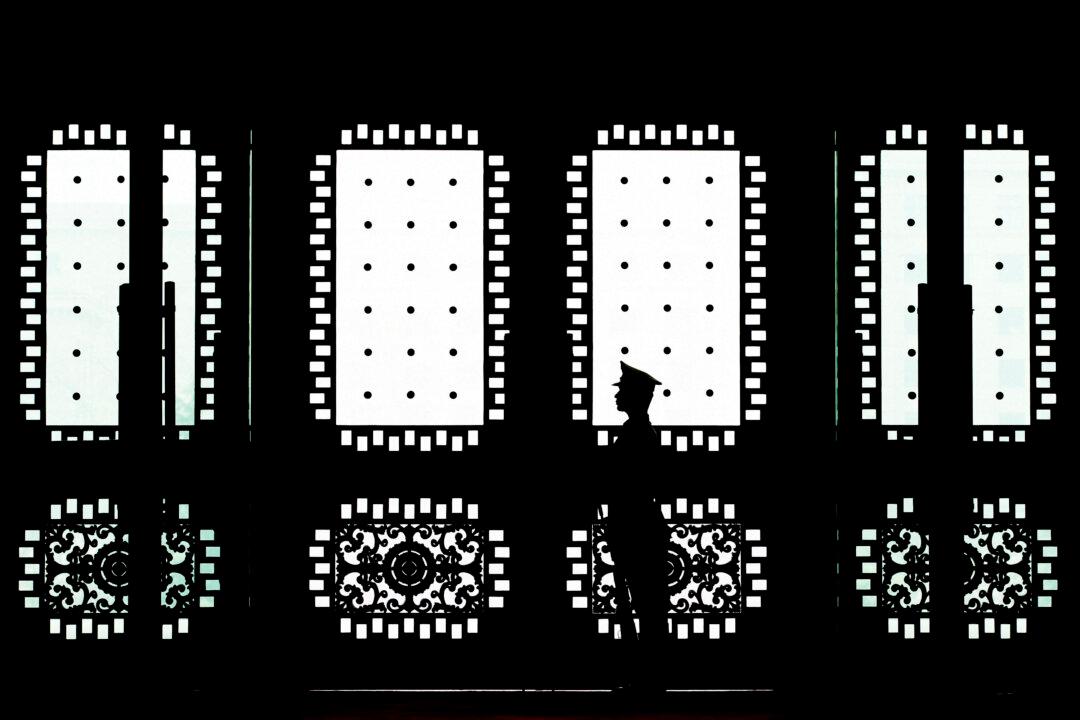 A Chinese soldier stands guard in Beijing on April 23, 2013. (Andy Wong/POOL/AFP via Getty Images)