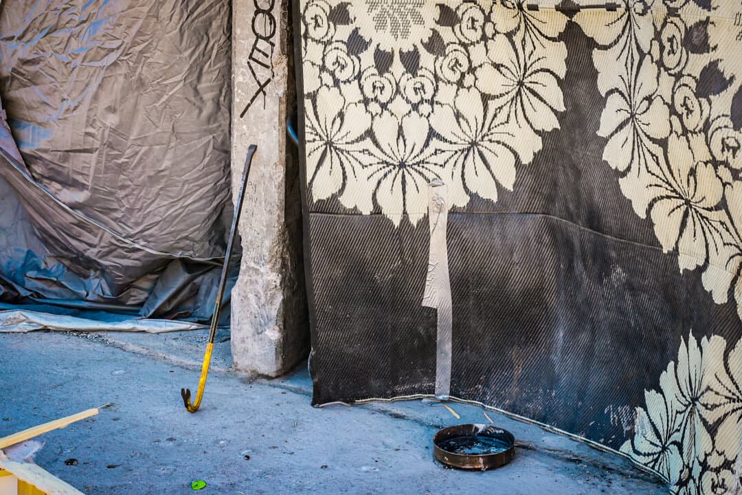 A crowbar used for defense sits at an entryway to a sewage tunnel leading to the Las Vegas Strip that houses a large number of homeless people in Las Vegas on Nov. 14, 2024. (John Fredricks/The Epoch Times)