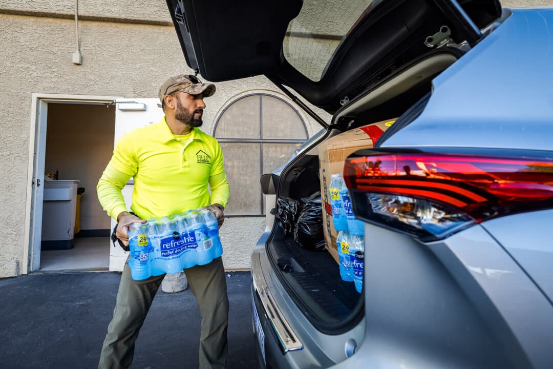 Abdul, a member of the HELP of Southern Nevada team, provides aid and information to homeless people in Las Vegas on Nov. 14, 2024. (John Fredricks/The Epoch Times)