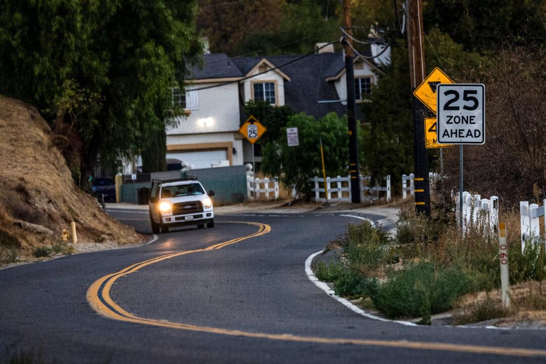 A car drives through Val Verde near the Chiquita Canyon Landfill on Nov. 22, 2024. (John Fredricks/The Epoch Times)
