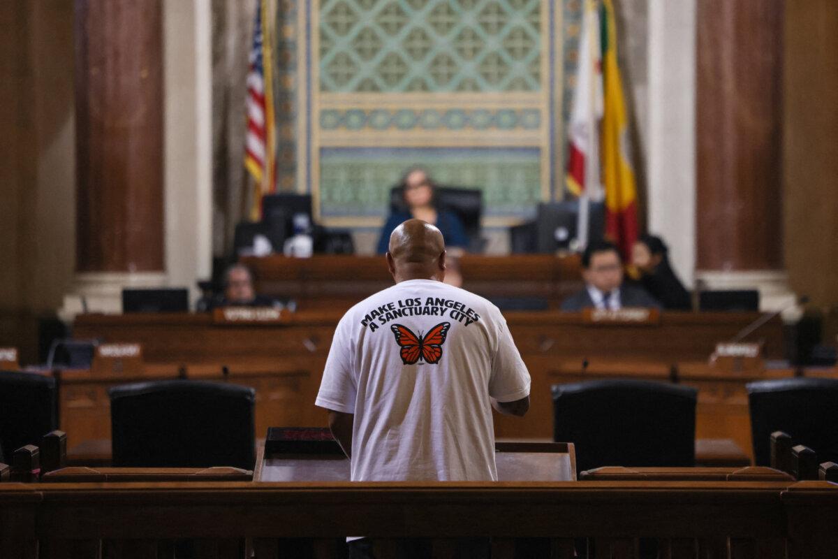 A man speaks in support of a proposed "sanctuary city" ordinance during a meeting at City Hall in Los Angeles on Nov. 19, 2024. (Etienne Laurent/AFP via Getty Images)