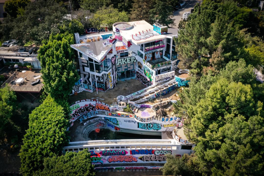 An abandoned mansion covered in graffiti in the Hollywood Hills neighborhood of Los Angeles on Sept. 20, 2024. Neighbors said the house has been a refuge for squatters coming and going for over two years. (Robyn Beck/ AFP/AFP via Getty Images)
